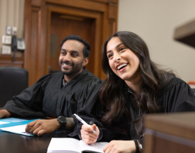 Two law students conducting a mock trial